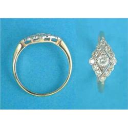 A gold diamond set lozenge shape cluster ring...