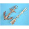 Image 1 : A gold bar brooch, in the form of 2 oars, together with an anchor brooch....