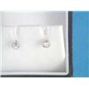 Image 1 : A pair of solitaire diamond earstuds, collet set in white gold...