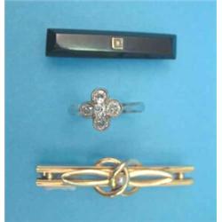 A platinum set 5-stone diamond flowerhead ring, a gold knot bar brooch set with a pearl and 1 oth...