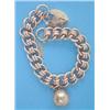 Image 1 : A 9ct gold fancy link flexible bracelet, with padlock clasp and attached engraved gold spherical...