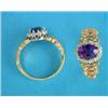 Image 1 : An 18ct gold cluster ring, set with an oval amethyst in a border of diamonds...