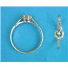 Image 1 : A platinum solitaire diamond ring, with diamond set shoulders, the brilliant cut stone approximat...
