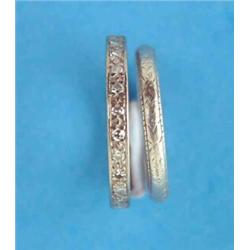 A diamond set full eternity ring, size L1/2, and a wedding ring...