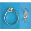 Image 1 : A solitaire diamond ring, claw-set with a cushion shape old brilliant cut stone...