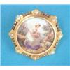 Image 1 : A 19th century circular gold and enamel brooch, depicting a shepherdess seated in a landscape, th...