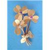 Image 1 : A 15ct gold brooch, designed as 3 clover leaves tied with a ribbon, set with a diamond, sapphire...