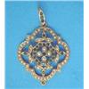 Image 1 : An Edwardian gold quatrefoil shape openwork pendant, set seed pearls and emeralds...