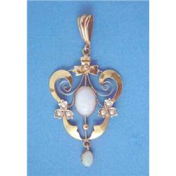 A 9ct gold openwork pendant, set opals and seed pearls...