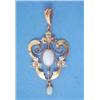 Image 1 : A 9ct gold openwork pendant, set opals and seed pearls...