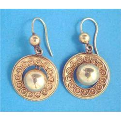 A pair of Victorian gold drop earrings, each with a central spherical bead within a wirework deco...