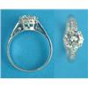 Image 1 : A platinum set solitaire diamond ring, with diamond shoulders, the brilliant cut stone approximat...
