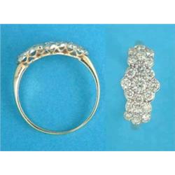 A gold and diamond triple cluster ring,...