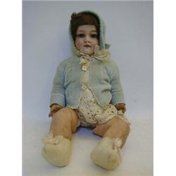 AN ARMAND MARSEILLE BISQUE HEAD DOLL, brown wig, sleeping eyes, open mouth, jointed body, nape ma...