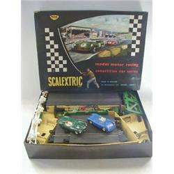 A BOXED SCALEXTRIC SET, No.CM.33, synthetic Jaguar and Porsche, track, accessories and instructio...