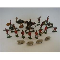 SIX BRITAINS TOY LEAD SOLDIERS, with eighteen other lead figures, including Cowboy and Indians, o...