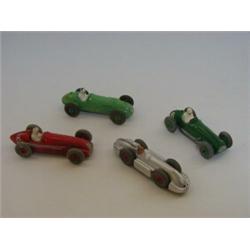 FOUR DINKY TOYS RACING CARS, (unboxed) No.s 23e, 23f, 23g and 235 (4)  30-40...
