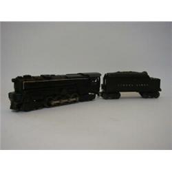 A LIONEL TRAINS 6-8-6 LOCOMOTIVE AND TENDER, No.671, O Gauge electric, matt black livery, tender...