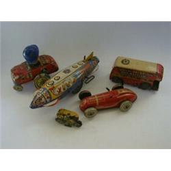 A TINPLATE MOON-RIDER SPACE SHIP, with approximately twelve other unboxed tinplate toys, includin...