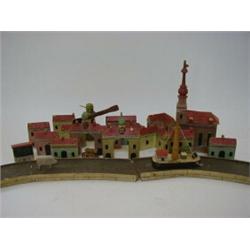 A CHILD'S MODEL OF A DUTCH TOWN, early 20th Century, comprising miniature painted wooden building...