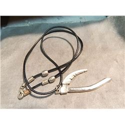 NECKLACE - SILVER SYTHE - ~2 ½" TALL - ON ROPE