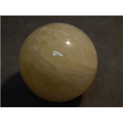 POLISHED STONE ORB - APPROX 1.25" DIAM -YELLOW