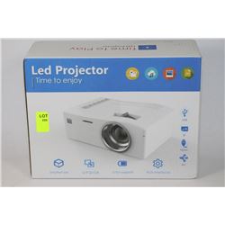 NEW WHITE LED PROJECTOR , PROJECTS UPTO 60"