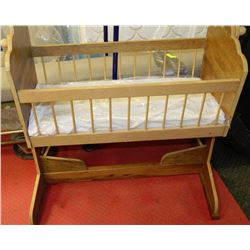 WOODEN DOLL CRADLE ON STAND