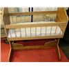 Image 1 : WOODEN DOLL CRADLE ON STAND