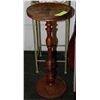 Image 1 : 2 PLANT HOLDER TABLES INCLUDING A WOOD ROUND ONE