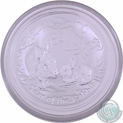 2011 $2 Australian 2oz Year of the Rabbit Fine Silver coin (Tax Exempt). Capsule is lightly scratche