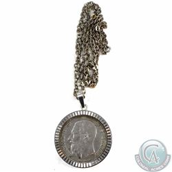 1873 Belgium 5 Francs in bezel.