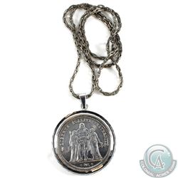 1873 France 5 Francs in bezel.