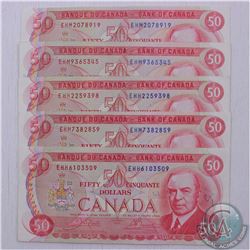 5 x 1975 $50.00 notes in average circulated condition.