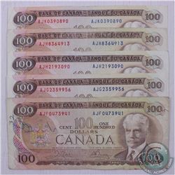 5 x 1975 $100.00 notes in average circulated condition.