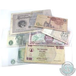 Group lot of seven world banknotes.  Countries included are England, Germany, Zimbabwe, Egypt, Italy
