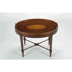 AN ANTIQUE INLAID MAHOGANY OVAL TEA TRAY, in the George III manner, crossbanded and inlaid with l...