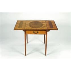 A GEORGE III SATINWOOD PEMBROKE TABLE , with rectangular top, inset with large emboyna wood panel...