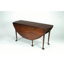 A MID-18TH CENTURY MAHOGANY OVAL DINING TABLE, with deep drop leaves and on six turned tapering s...