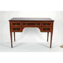 AN EDWARDIAN INLAID MAHOGANY DESK, fitted five short drawers to the apron, with satinwood crossba...