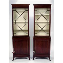 A PAIR OF ANTIQUE MAHOGANY CABINETS, in the George III manner, the upper sections fitted single f...