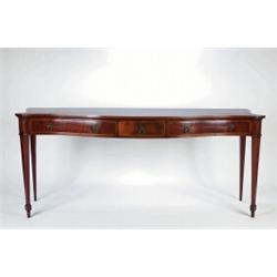 AN ANTIQUE MAHOGANY SERPENTINE FRONT SERVING TABLE, inlaid with boxwood stringing, three drawers...
