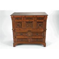 A LATE 17TH CENTURY ENGLISH OAK AND FRUITWOOD CHEST, of four long drawers, the drawer fronts all...