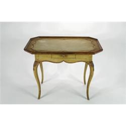 A LATE 18TH CENTURY NORTH EUROPEAN OCCASIONAL TABLE, painted and gilded, with overhanging tray to...