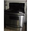 Image 1 : FRIGIDAIRE STAINLESS STEEL AND BLACK COIL TOP STOVE