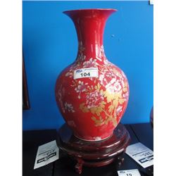 RED PAINTED CHINESE VASE WITH ROSEWOOD STAND