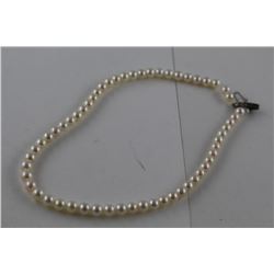 ONE STRAND OF ROUND WHITE JAPANESE AKOYA CULTURED PEARLS