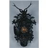 Image 1 : BLACK FOREST CARVED AND EBONISED WOOD CASED CUCKOO CLOCK, carved with hanging hare, pheasant, lar...
