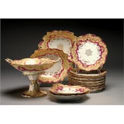 ENGLISH PORCELAIN APRICOT-GROUND DESSERT SERVICE, the moulded foliate rims painted and printed wi...