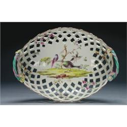 DERBY OVAL BASKET, the sides with pierced trelliswork applied with yellow mayflowers at the inter...